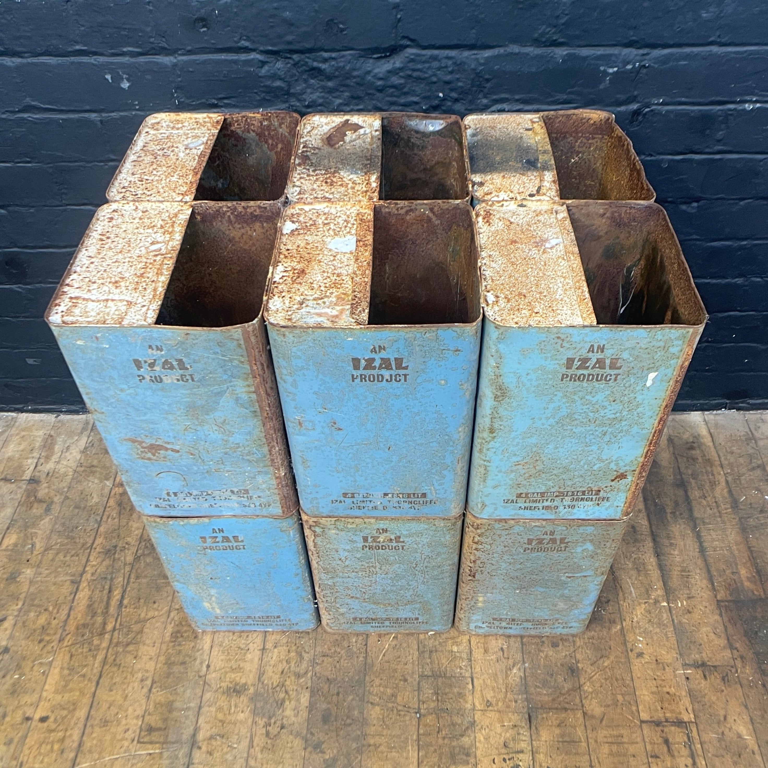 blue industrial storage tins stacks Industrial powerhouse props prop rental hire vintage movie film set dec 2