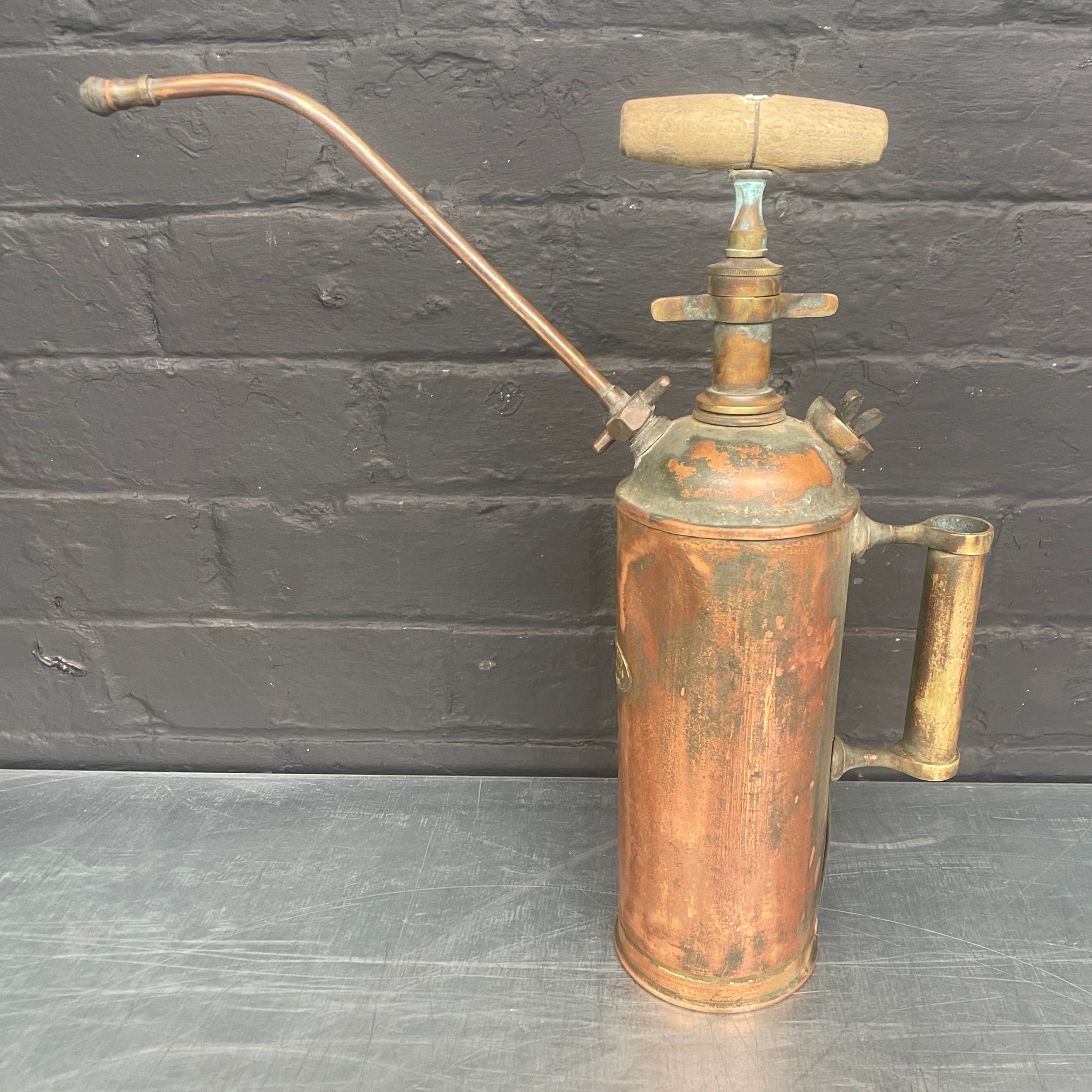 copper oil can pump Industrial powerhouse props prop rental hire vintage movie film set dec