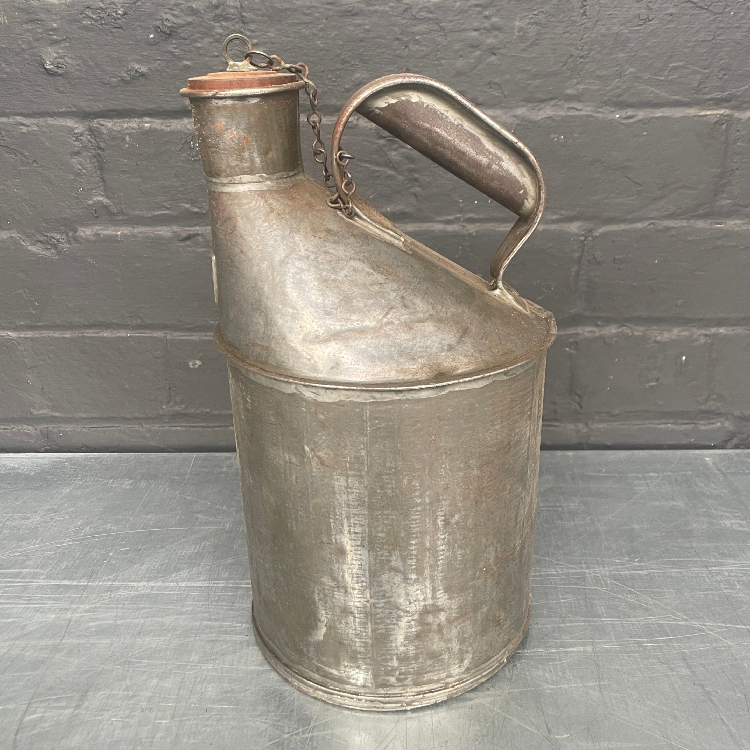 gallon jug tin oil can steel metal Industrial powerhouse props prop rental hire vintage movie film set dec