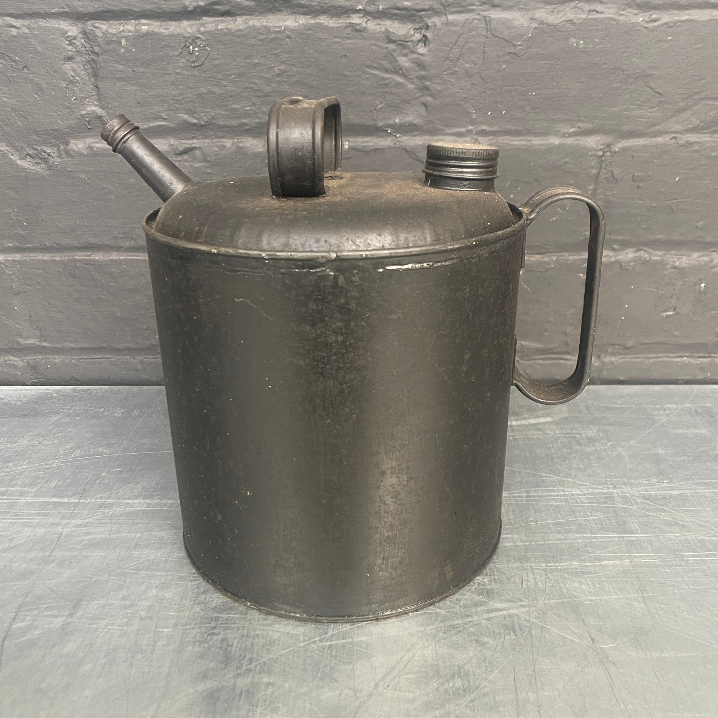 grey jug tin oil can steel metal Industrial powerhouse props prop rental hire vintage movie film set dec