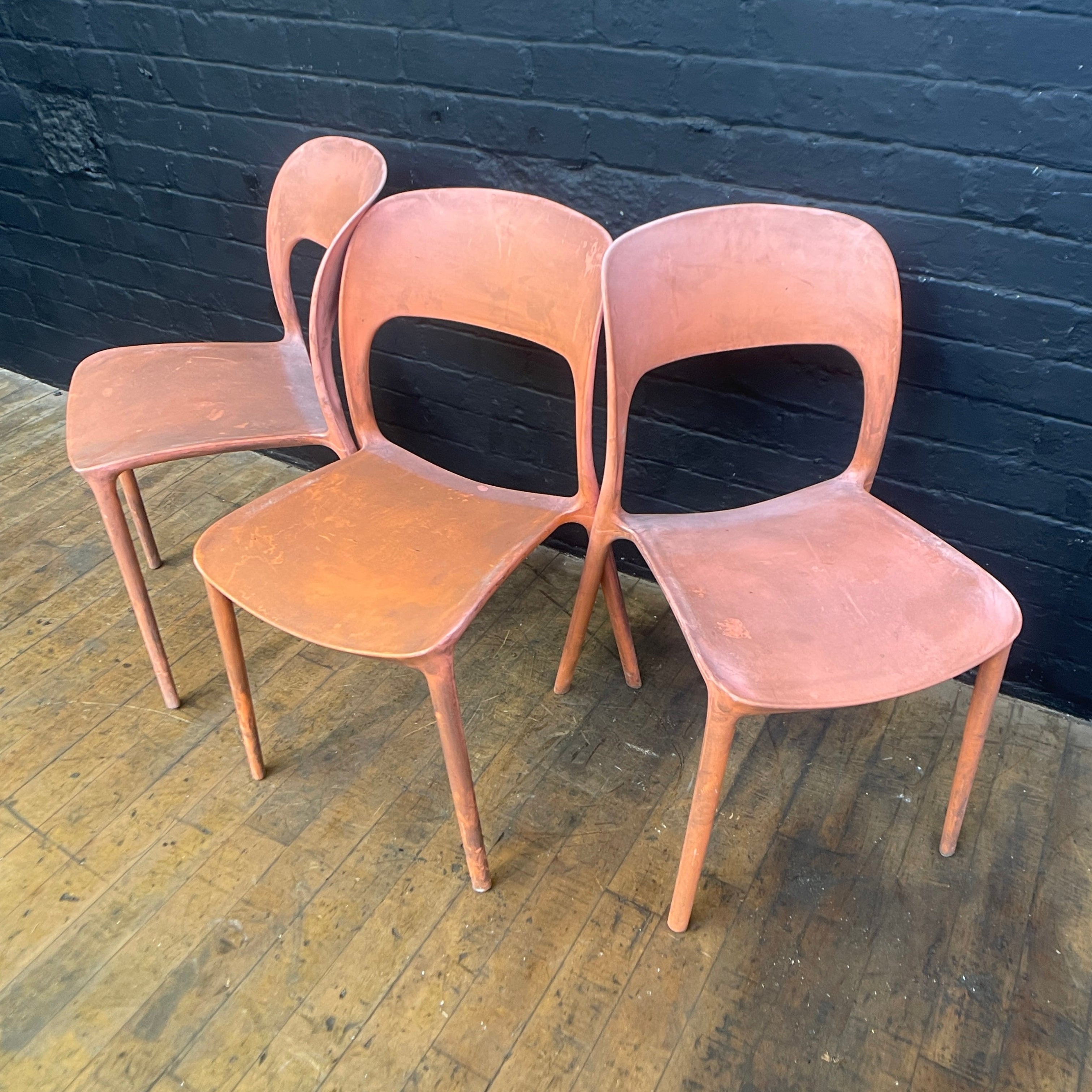 stackable plastic chairs orange Industrial powerhouse props prop rental hire vintage movie film set dec 1