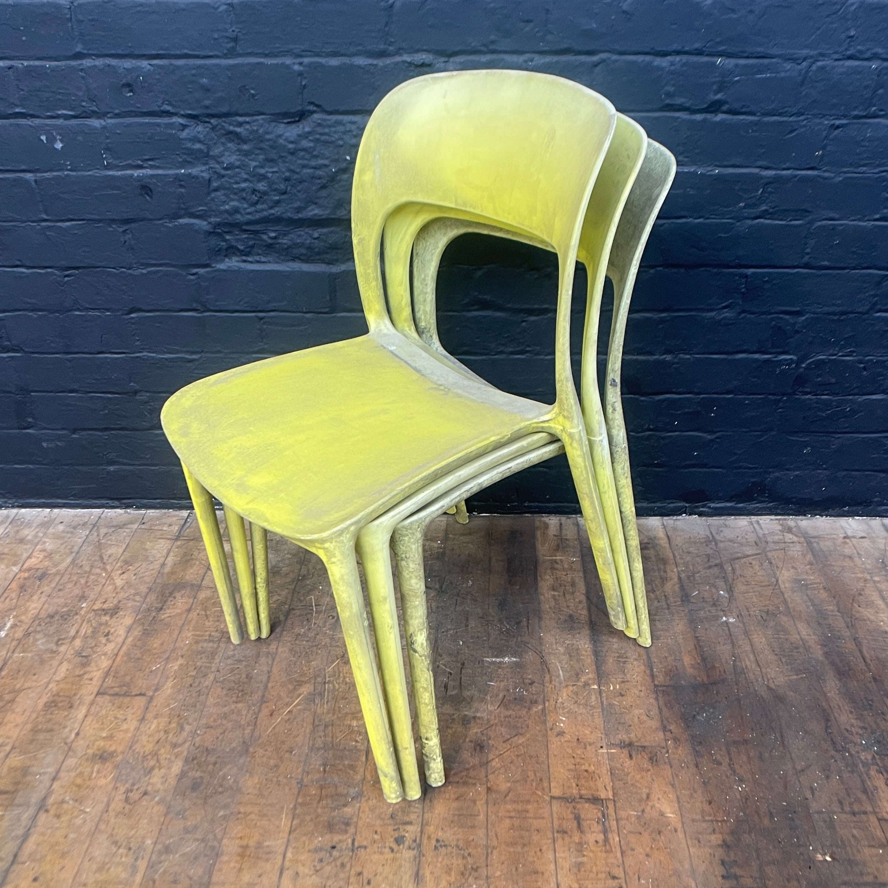 stackable plastic chairs yellow Industrial powerhouse props prop rental hire vintage movie film set dec 2