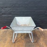Industrial powerhouse props prop rental hire vintage movie film set dec galvanised wheel barrow old red silver