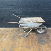 Industrial powerhouse props prop rental hire vintage movie film set dec galvanised wheel barrow old red silver battered