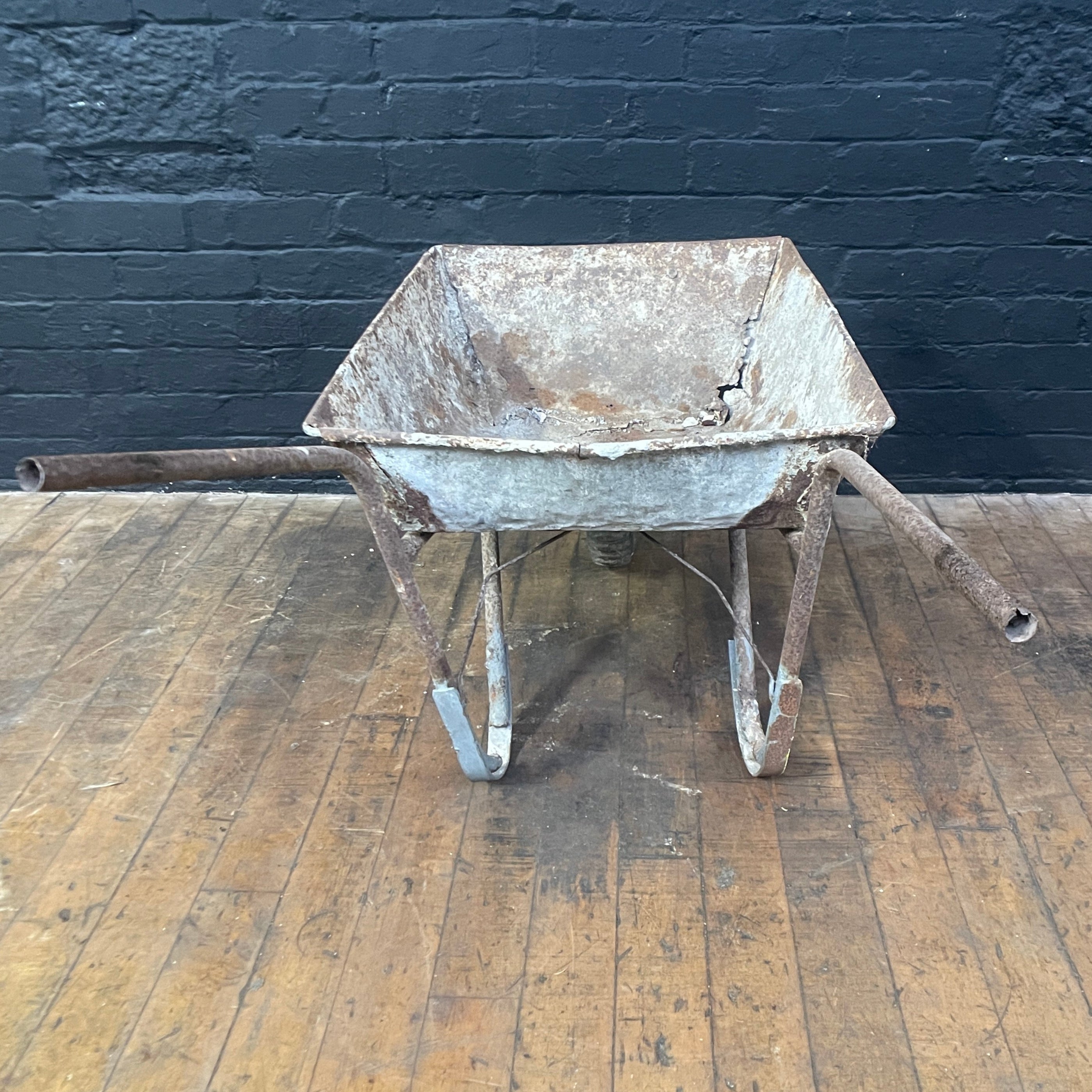 Industrial powerhouse props prop rental hire vintage movie film set dec galvanised wheel barrow old red silver battered 1