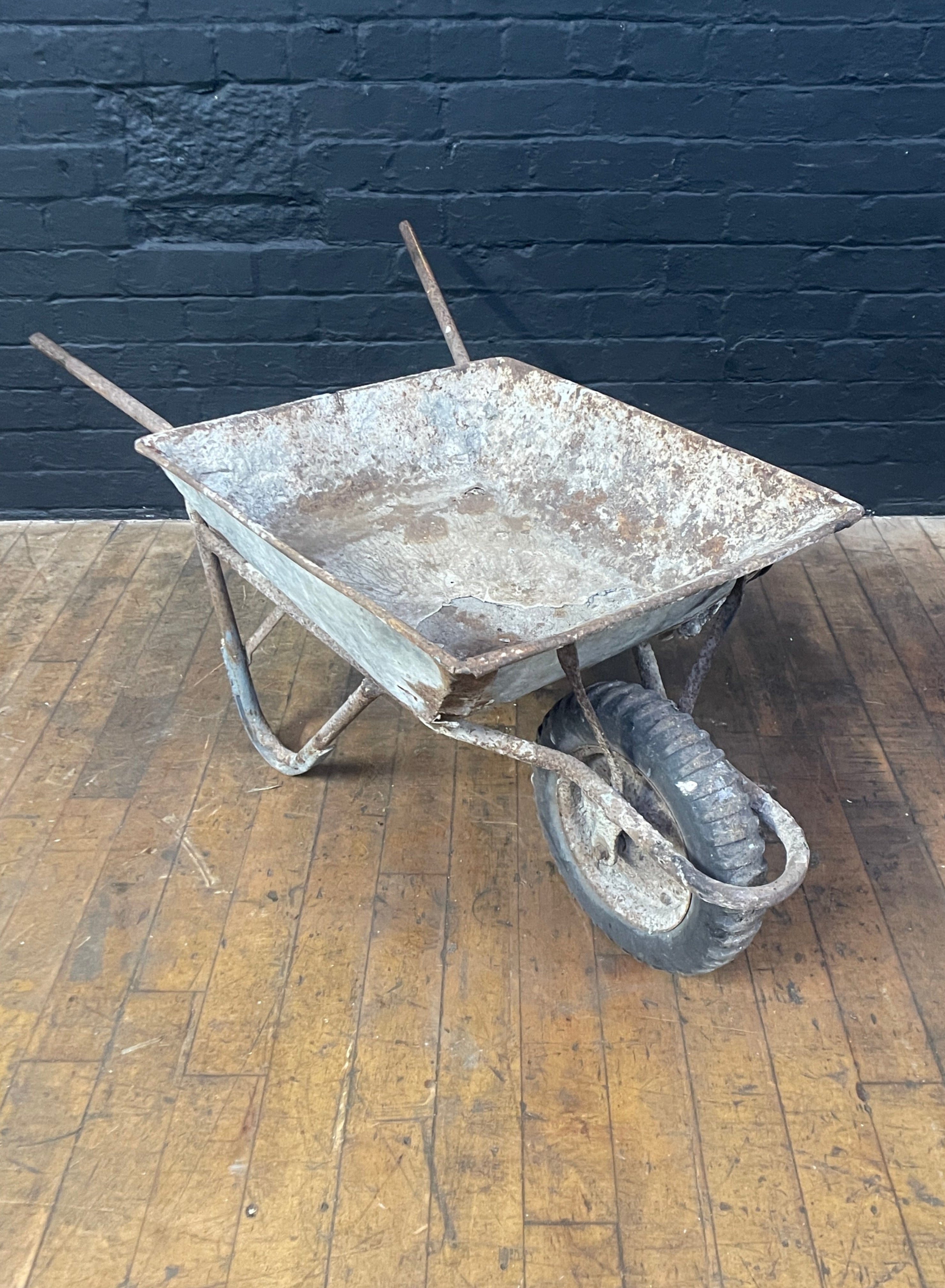 Industrial powerhouse props prop rental hire vintage movie film set dec galvanised wheel barrow old red silver battered 2