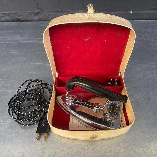 Boxed travel iron Qty 1