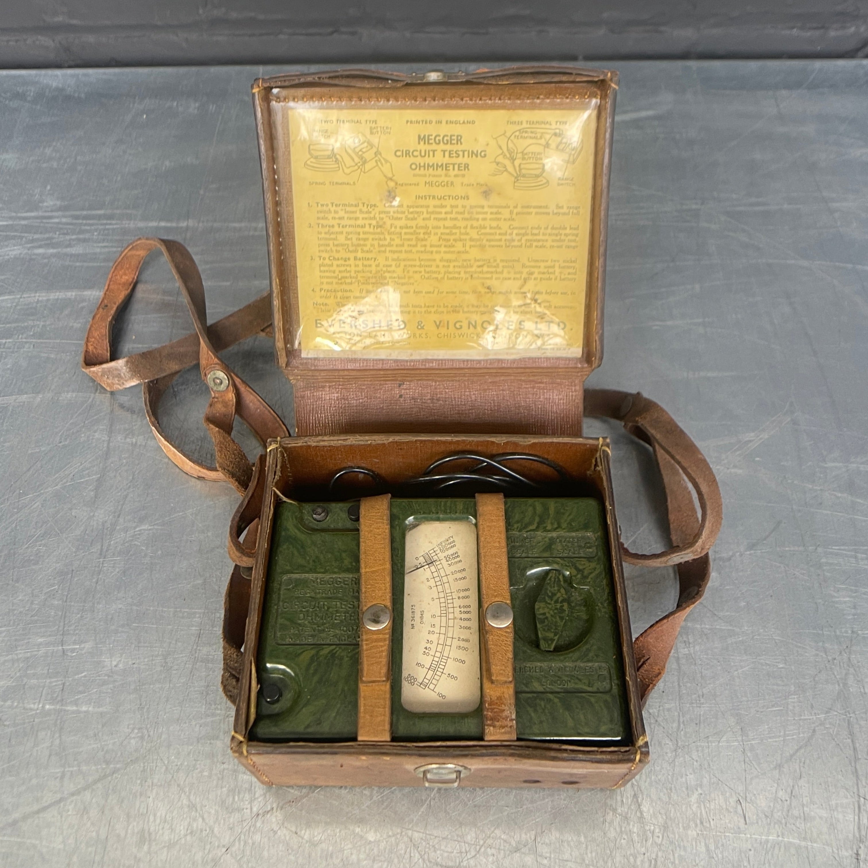 Megger OHMS tester electrical scientific Industrial powerhouse props prop rental hire vintage movie film set dec green
