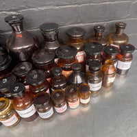brown old vintage apothecary bottles chemist Industrial powerhouse props prop rental hire vintage movie film set dec 4