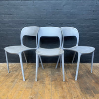 stackable plastic chairs grey Industrial powerhouse props prop rental hire vintage movie film set dec