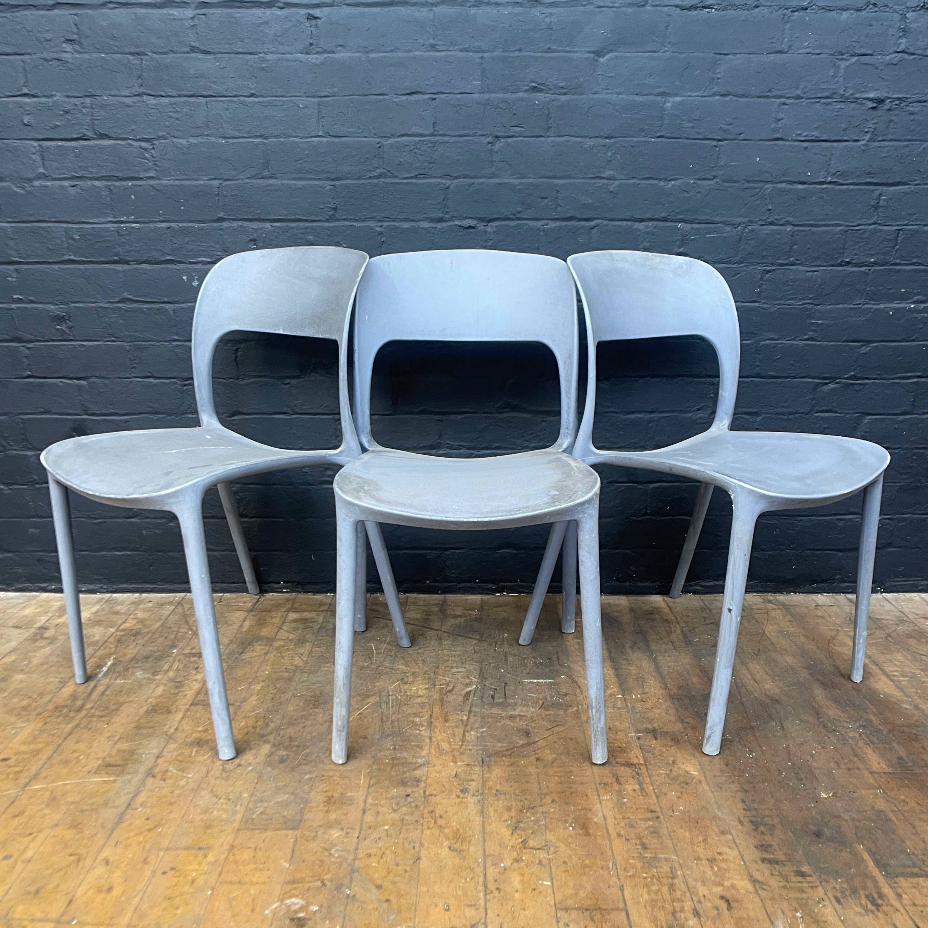 stackable plastic chairs grey Industrial powerhouse props prop rental hire vintage movie film set dec